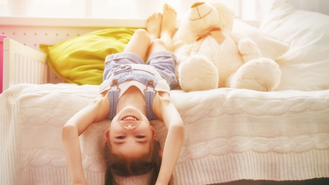 girl plays at home